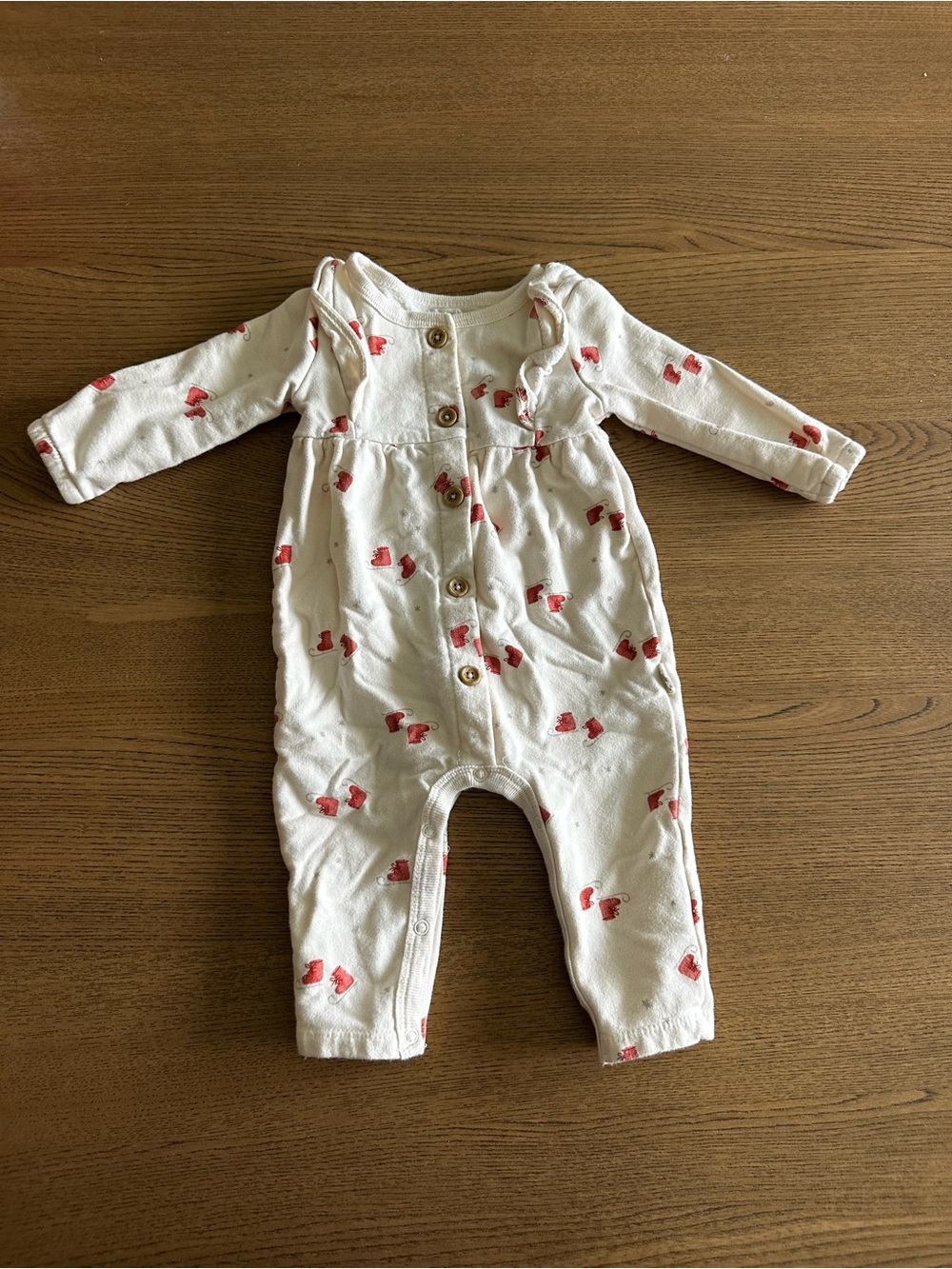 Baby Long-Sleeve White One-Piece with Red skates Detail